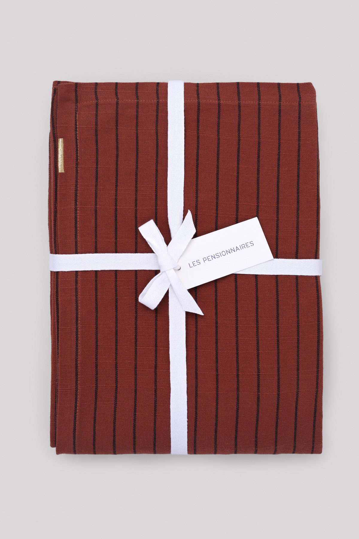 Rust red striped tablecloth in slub cotton