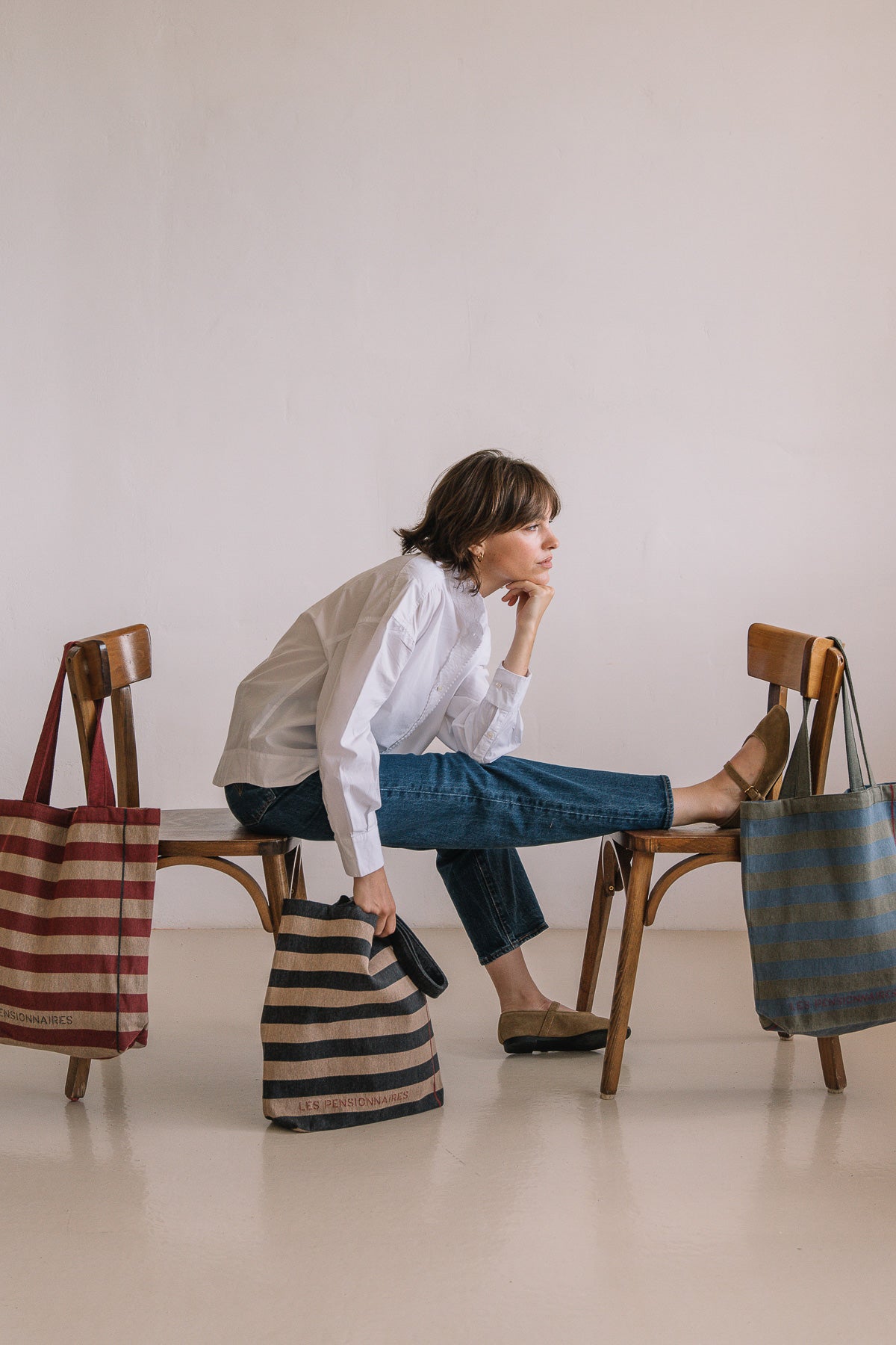 Green and blue striped tote bag made from recycled fibers