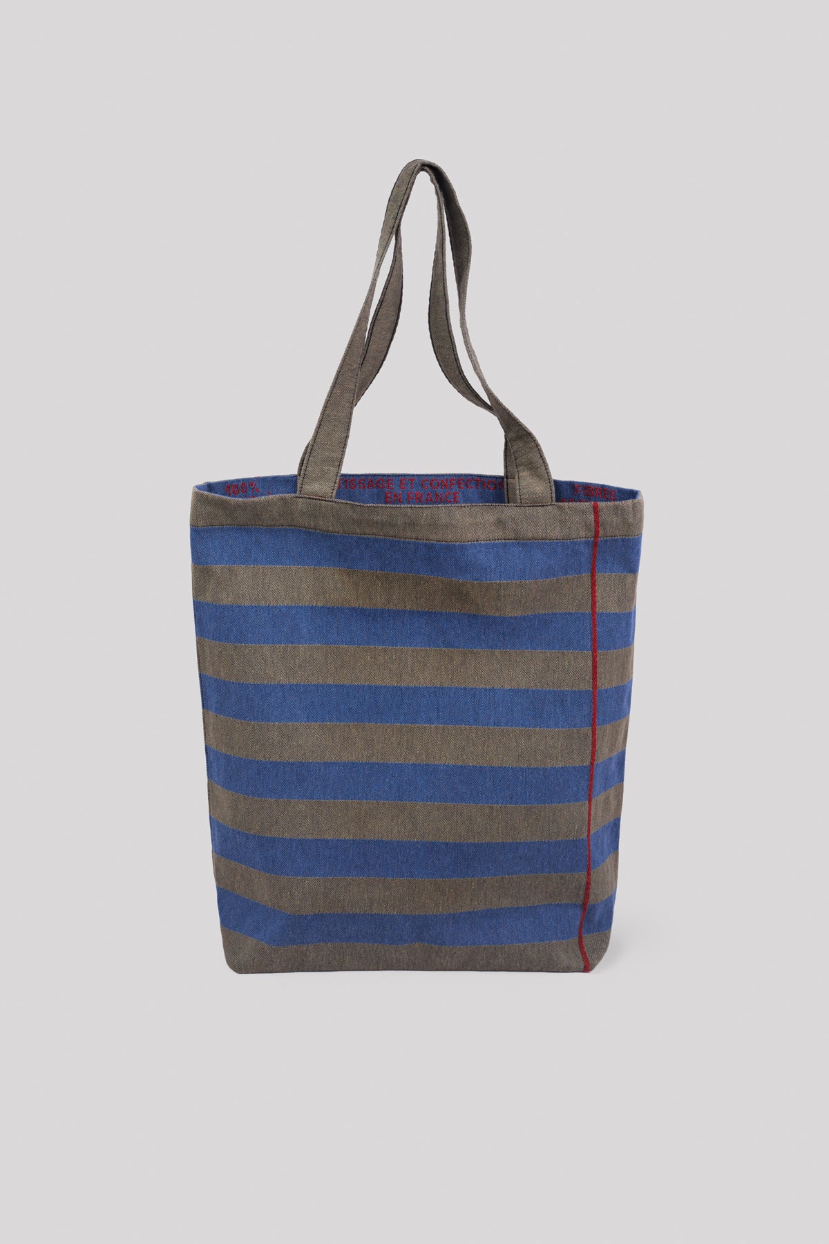 Green and blue striped tote bag made from recycled fibers