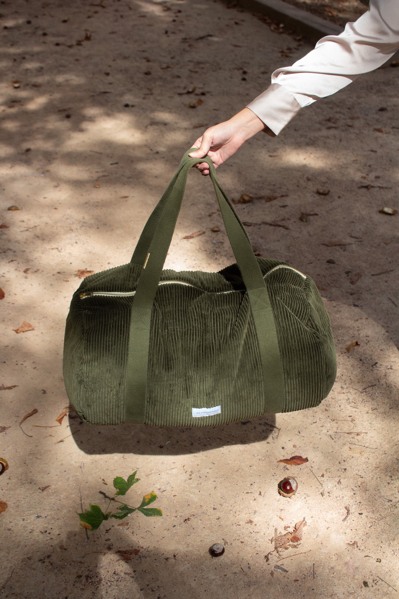 Caper green corduroy bowling bag