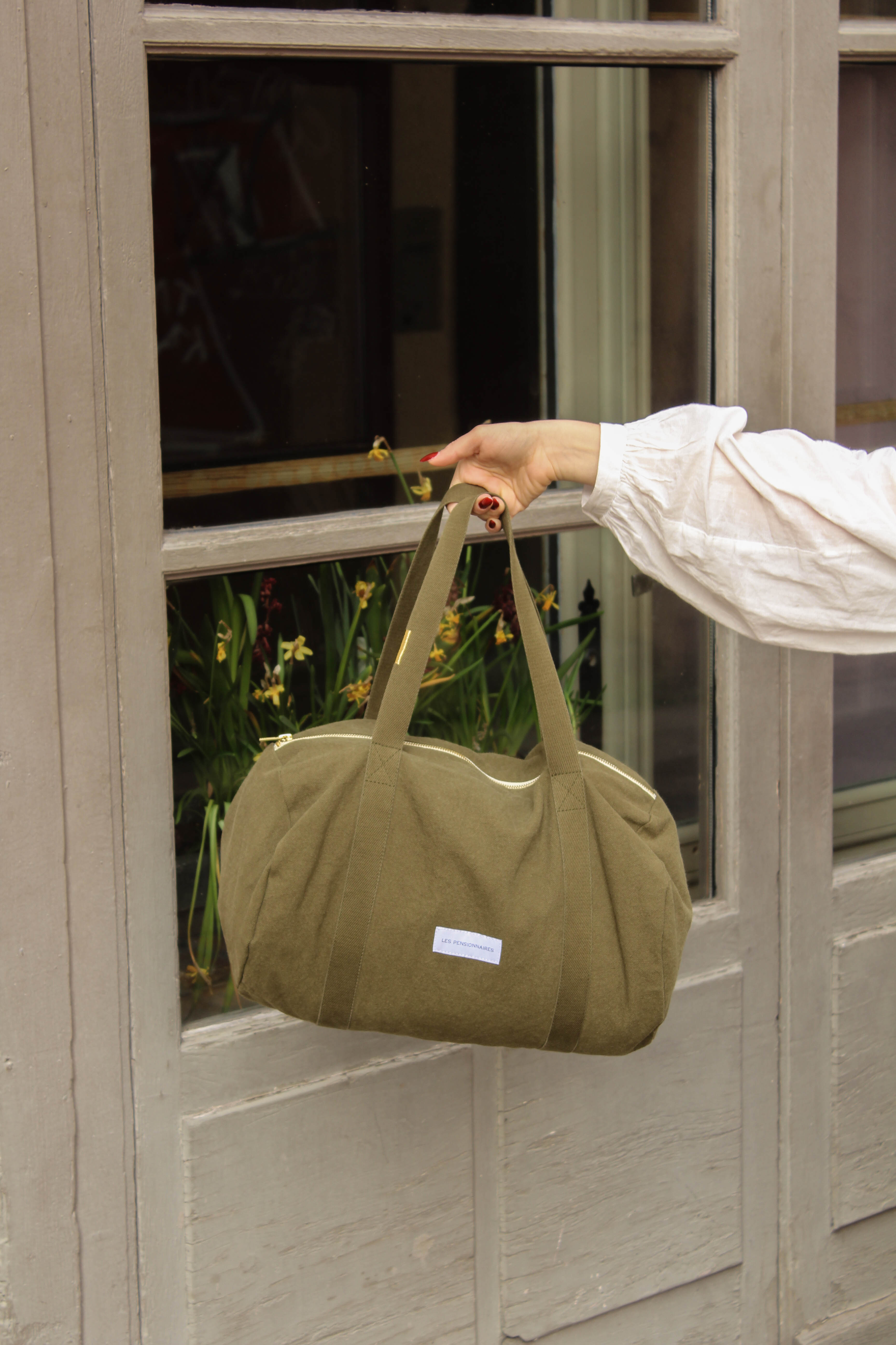 Caper green organic cotton mini bowling bag