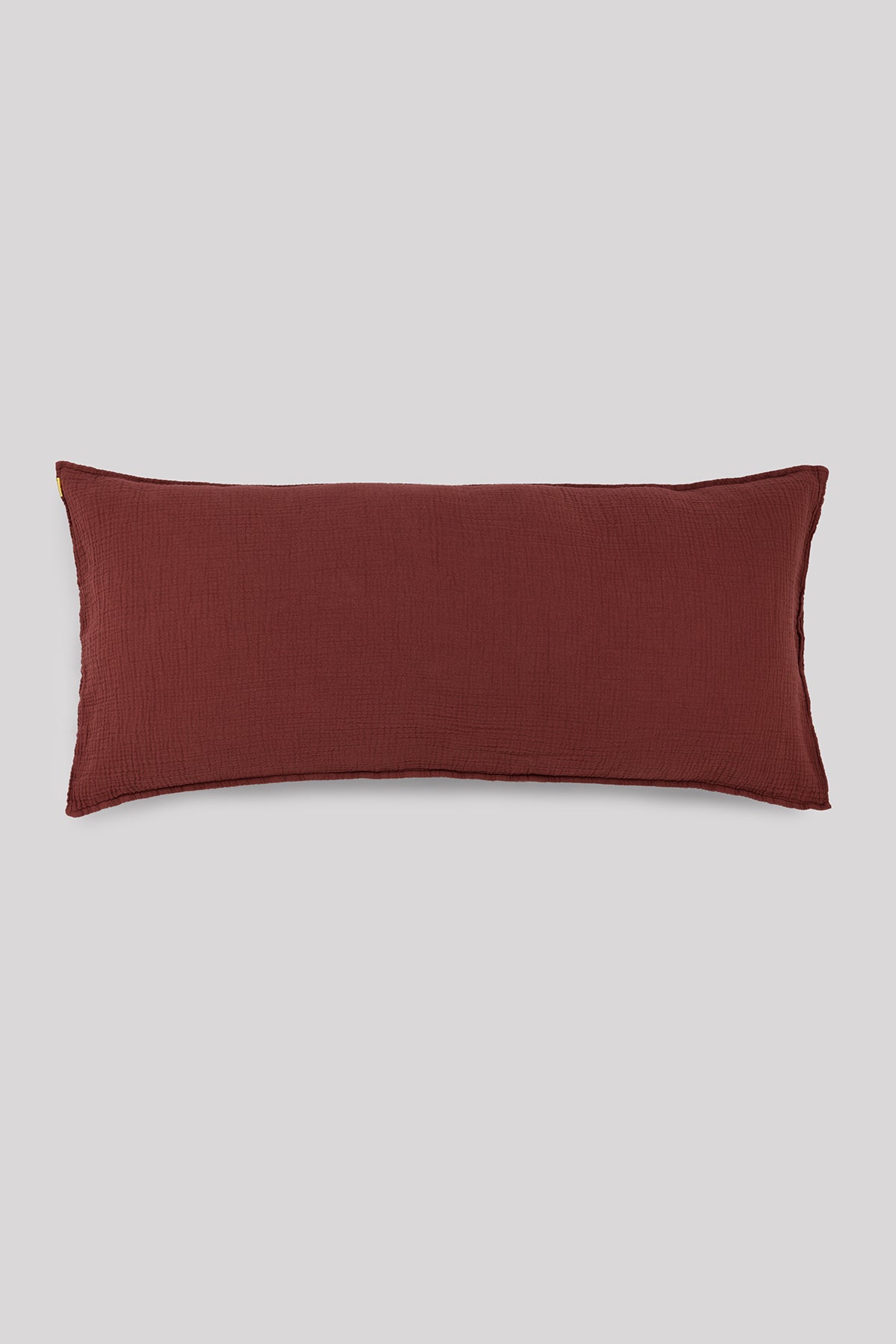 Grand coussin déhoussable en double gaze de coton rouille 45x90cm