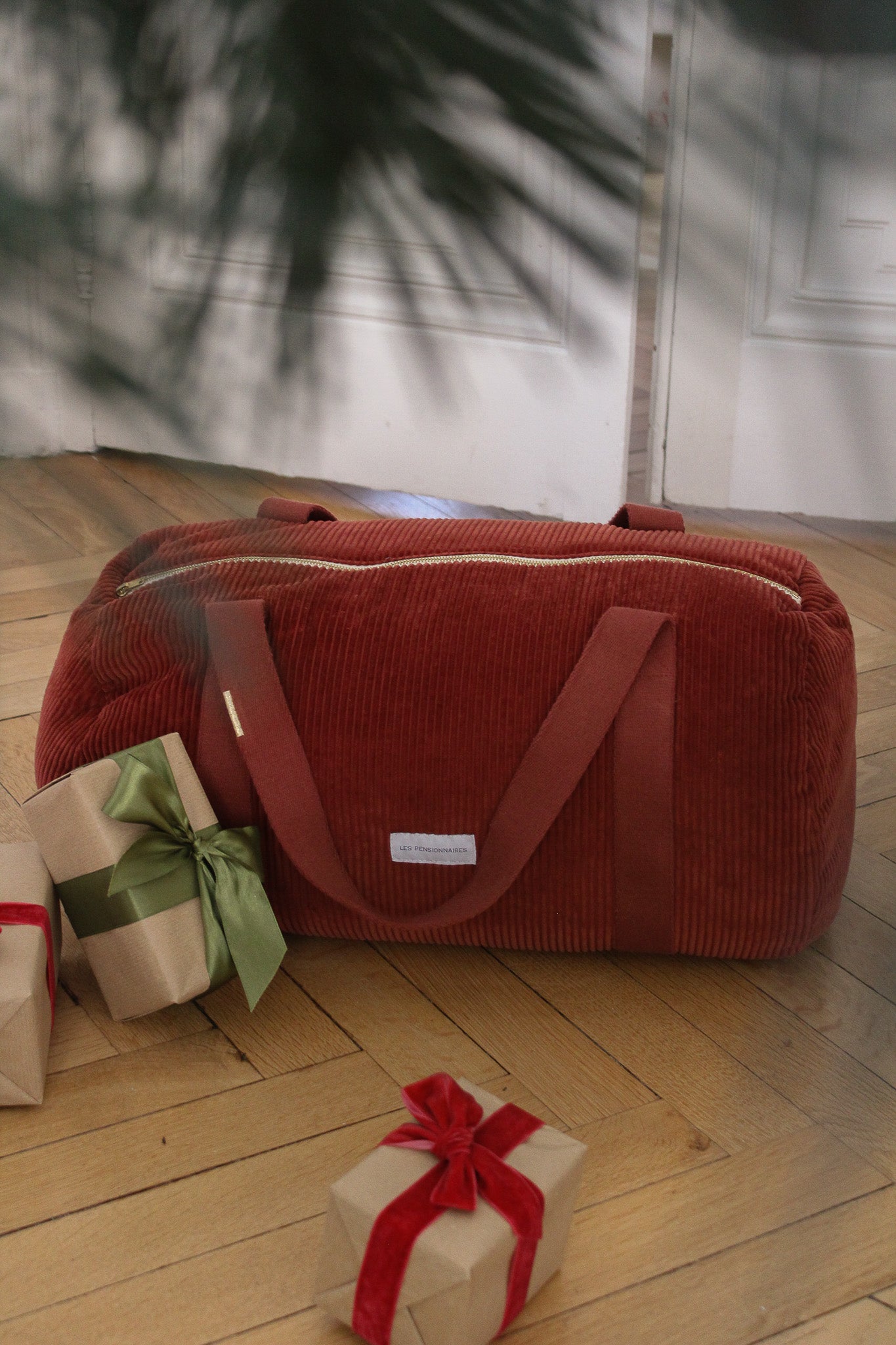 Rust red corduroy bowling bag