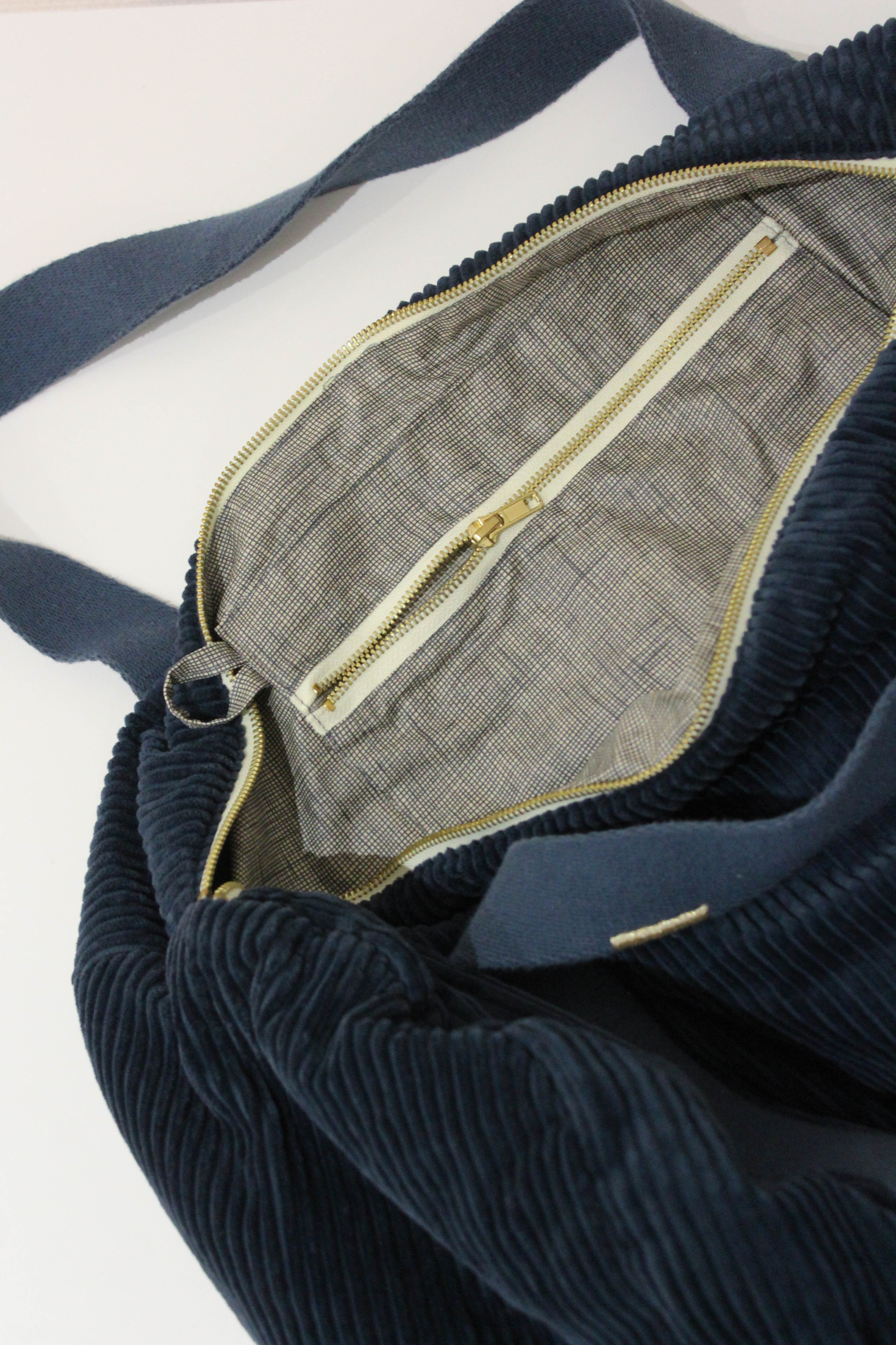 Caper green corduroy bowling bag